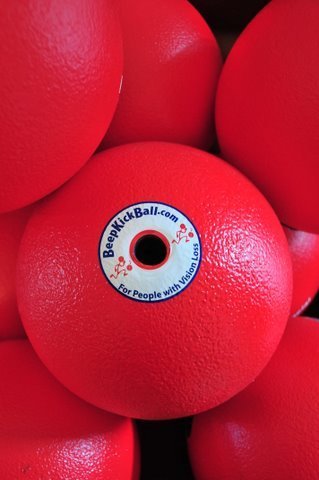 A pile of red Beep Kickballs.